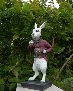 white rabbit sculpture on a plinth