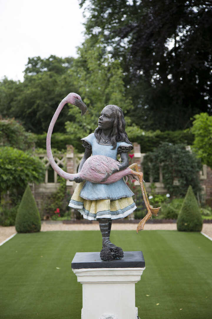 Bronze sculpture of Alice and the Flamingo