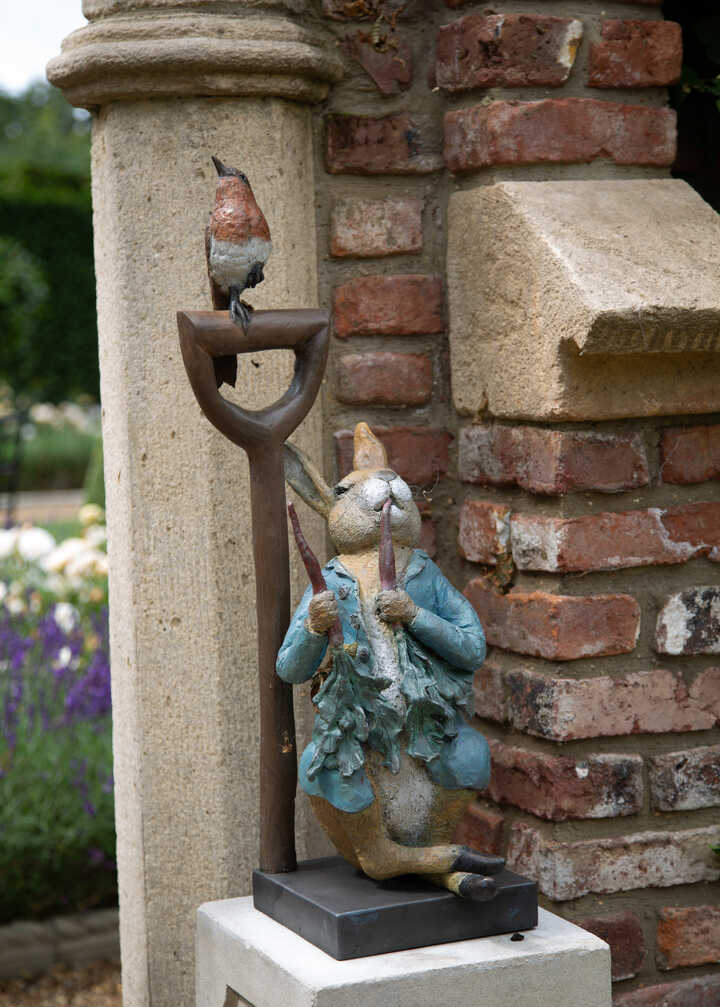 Peter Rabbit Eating Radishes Sculpture with Hot Cast Robin and Dibber