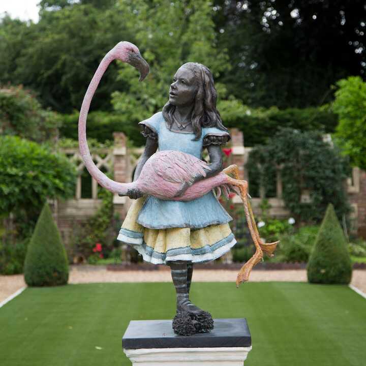 Alice with Flamingo - Bronze Garden Sculpture